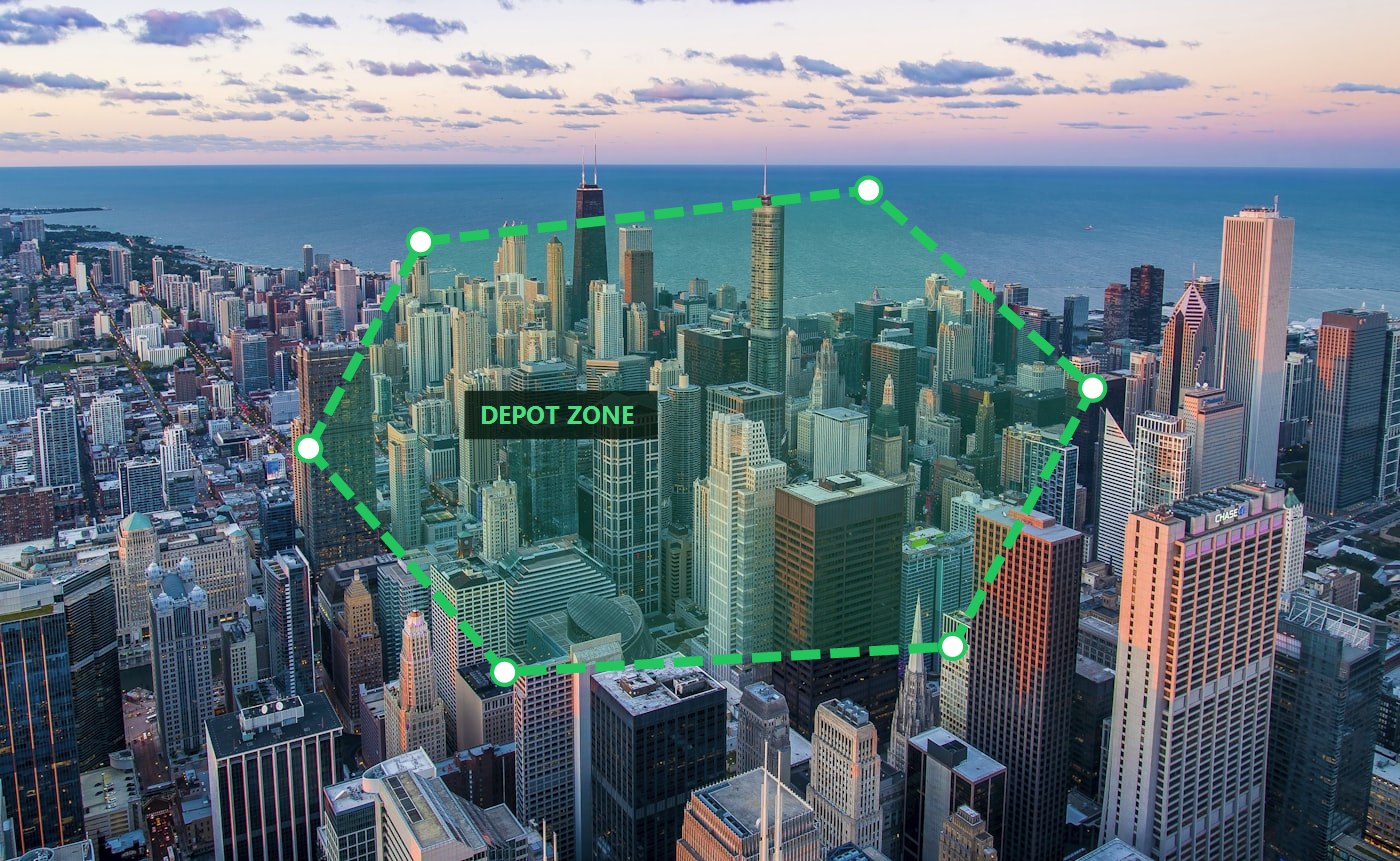 City aerial with a dashed geofence boundary around the depot zone