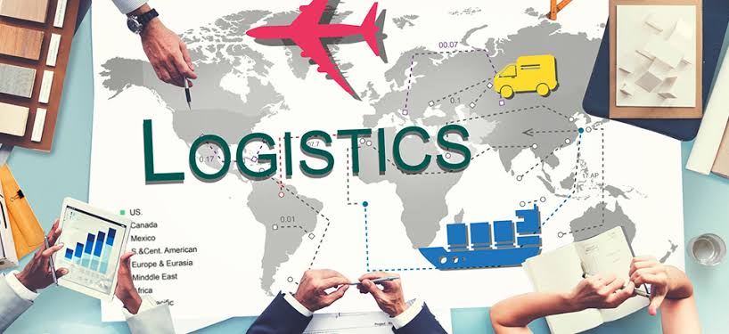Team planning distribution routes over a world logistics map with air, road and sea legs